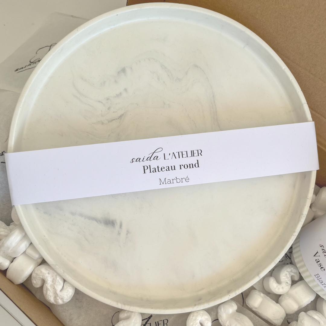 Plateau rond décoratif Marbré legèrement.